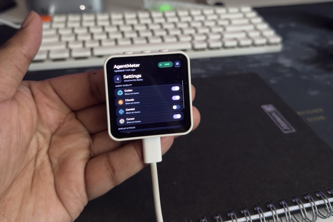 AgentMeter touchscreen settings for choosing which coding agents appear